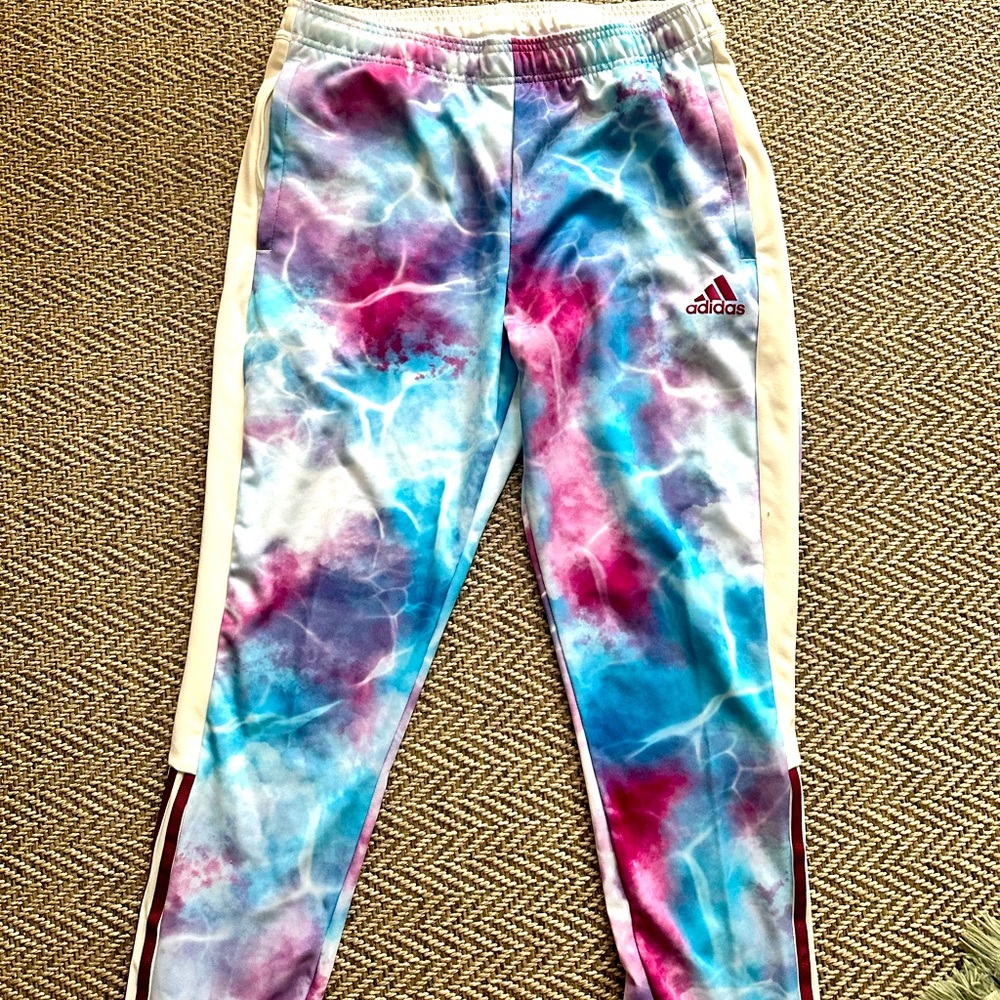 Adidas L soccer pants with zippers near the lower leg.